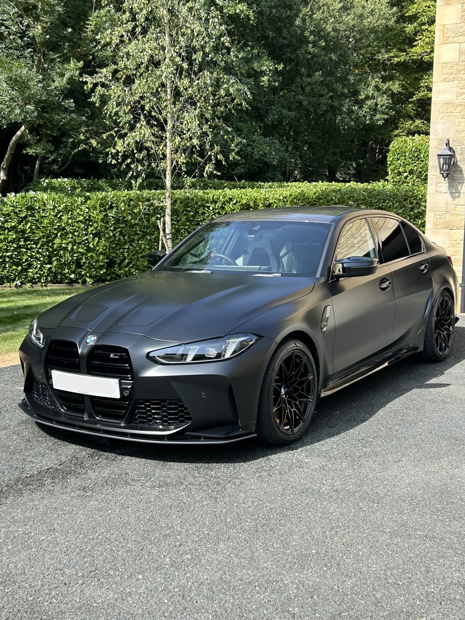 Matte black BMW M3 after an exterior valet in Rutland