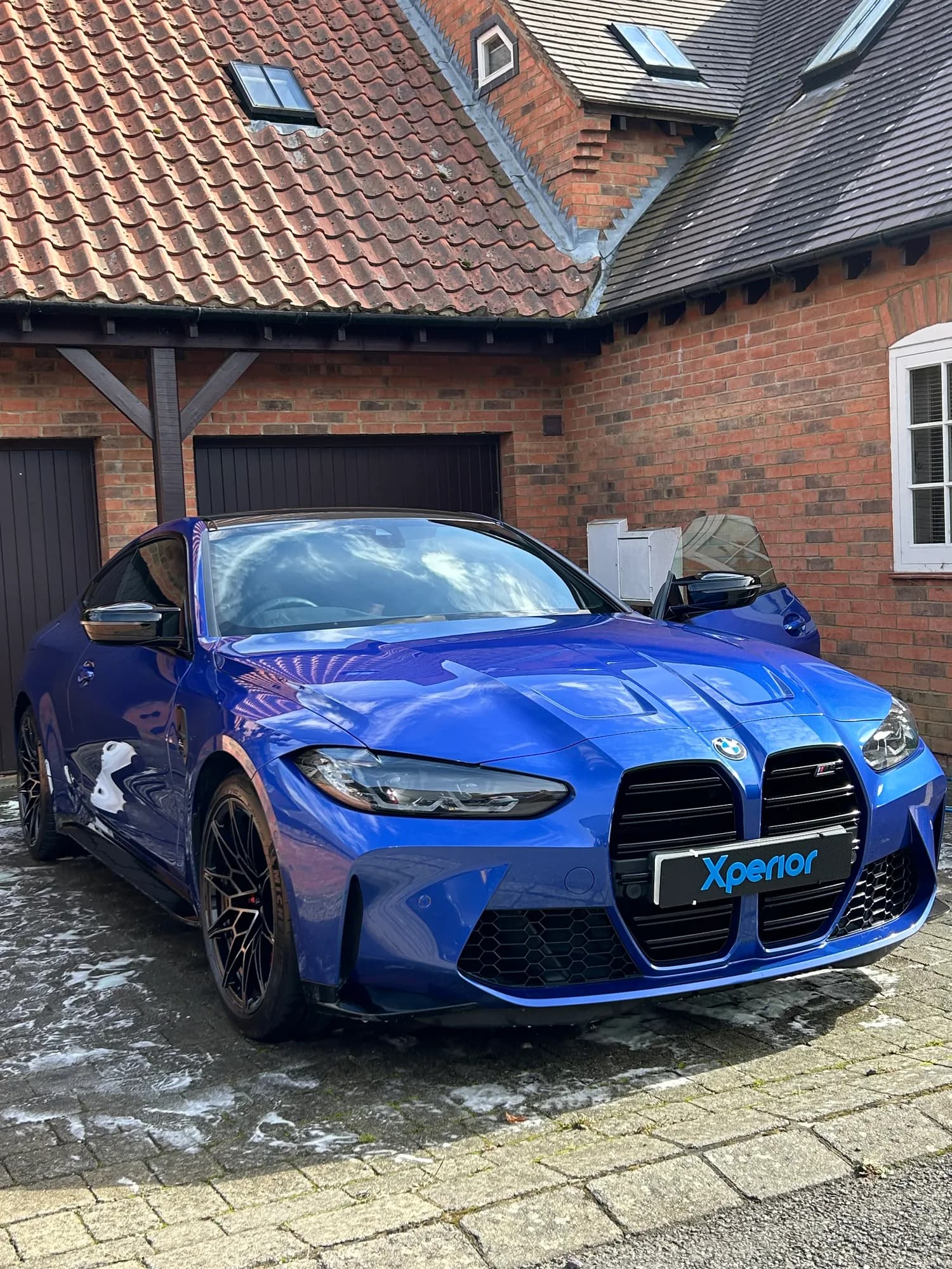 BMW M4 in Portimao Blue after ceramic coating in Market Harborough