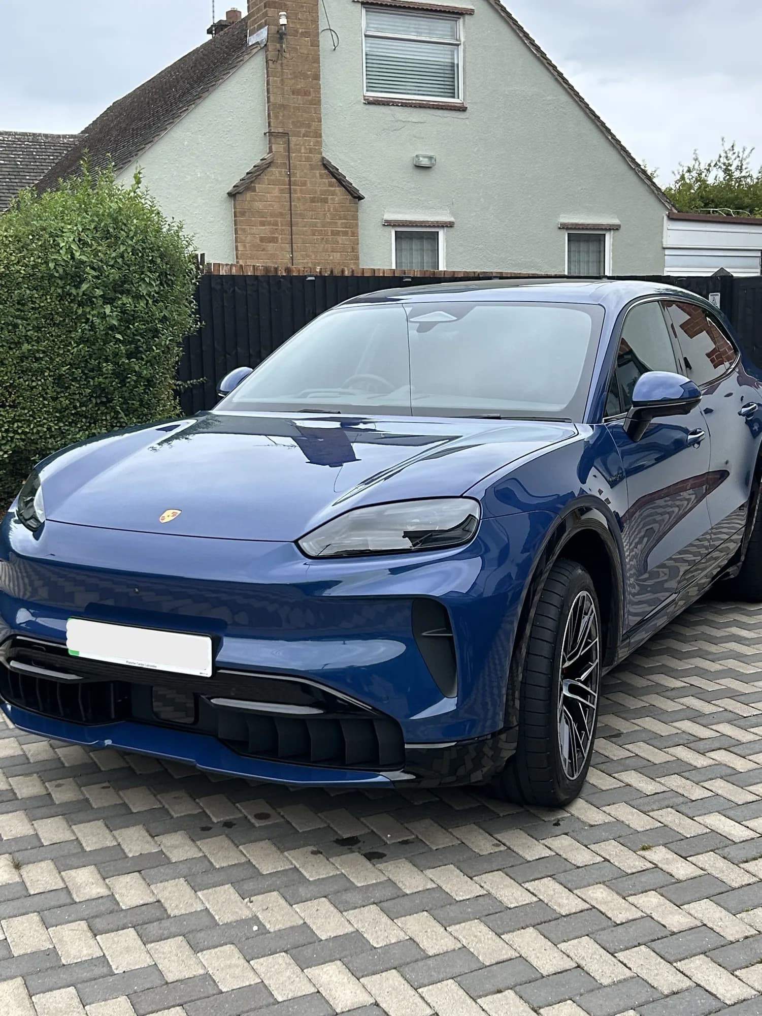 Blue Porsche Cayenne after a valet in Leicester