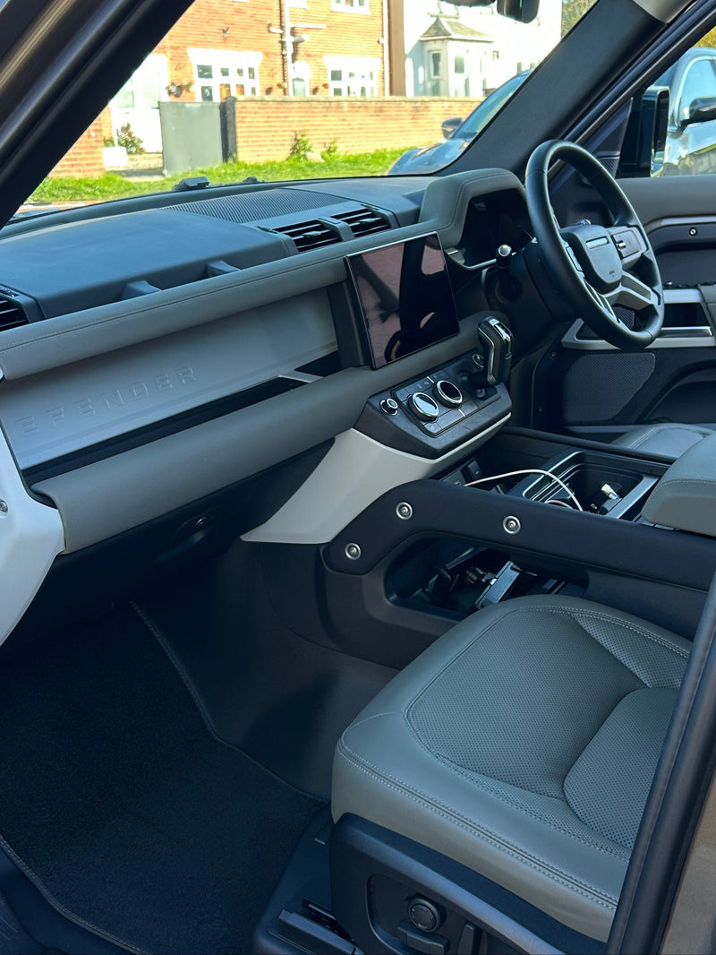 Clean Interior view of a vehicle with steering wheel and dashboard