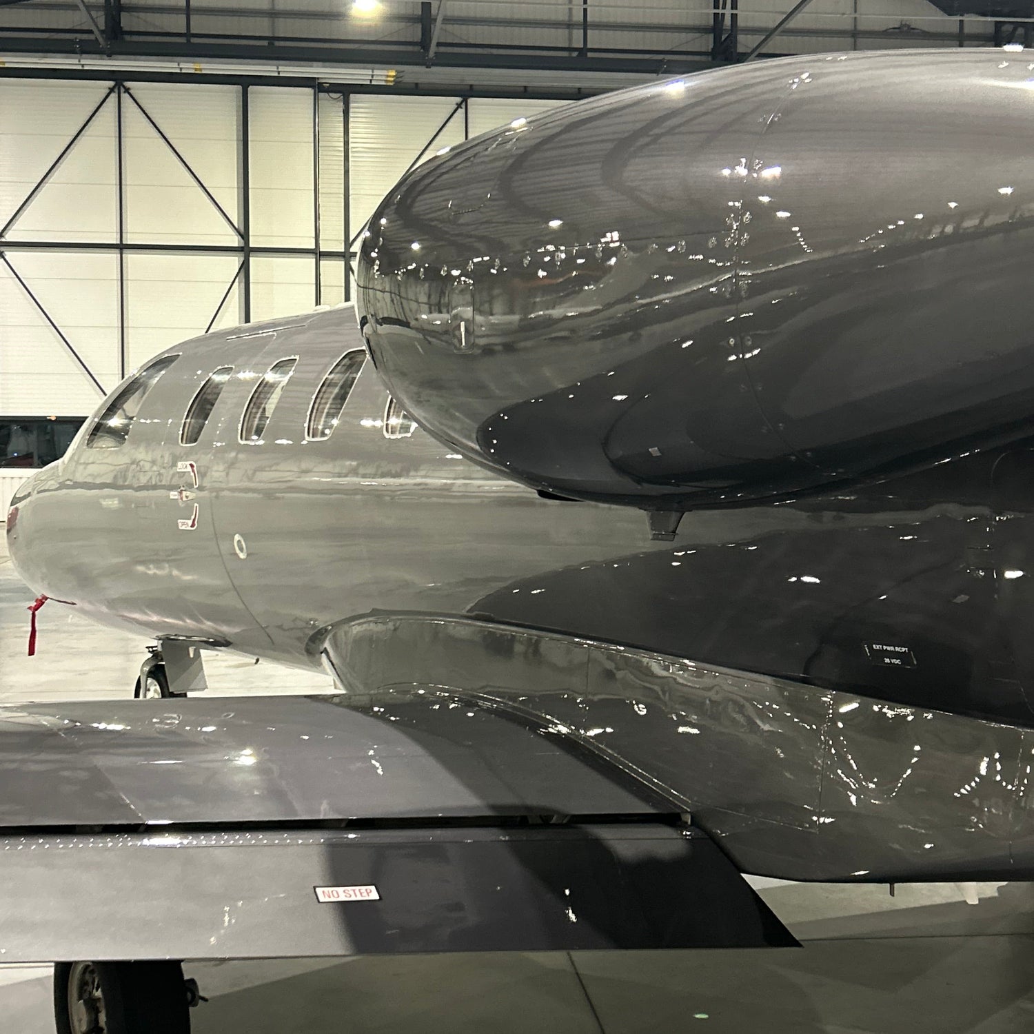 Close up of an aircraft exterior after an exterior dry wash, looking glossy