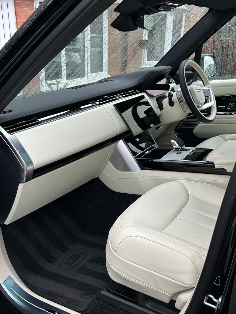 Picture of range rover cream leather interior after car detailing